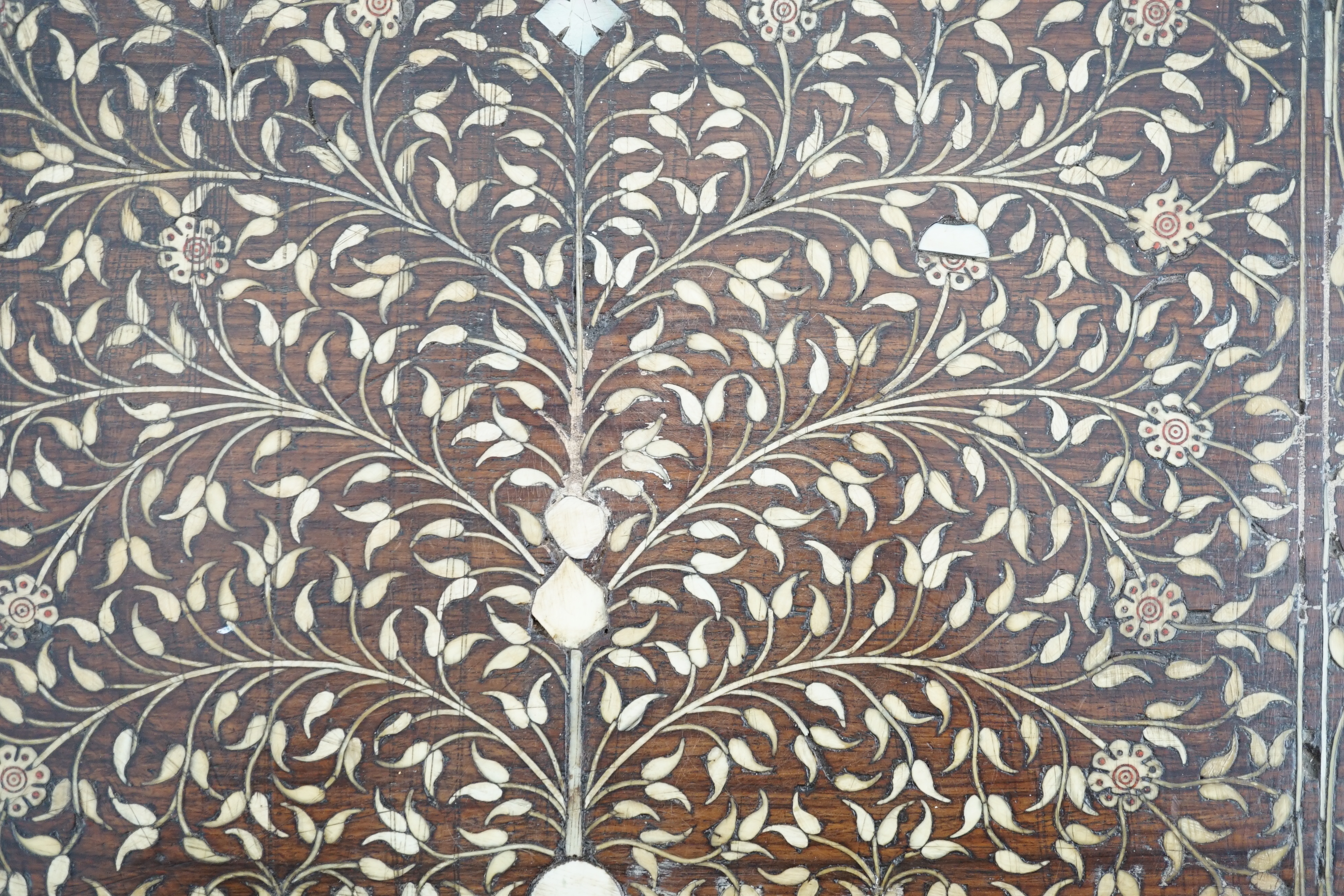 An early 17th century Indo-Portuguese ivory inset hardwood travelling chest